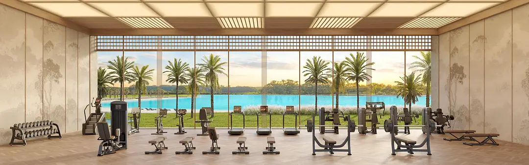 Fitness center by Technogym, com fachada envidraçada voltada para a lagoa